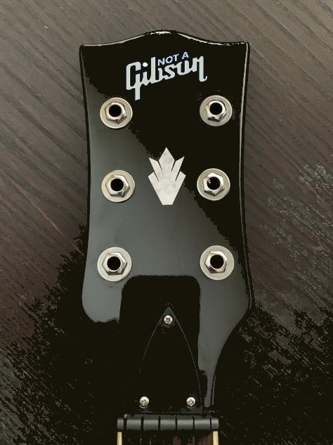 Not a Gibson Headstock (1).JPG