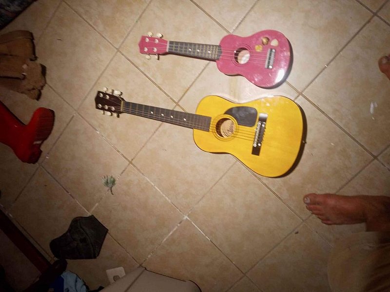 Kid guitar, pink uke, ugly feet.jpg