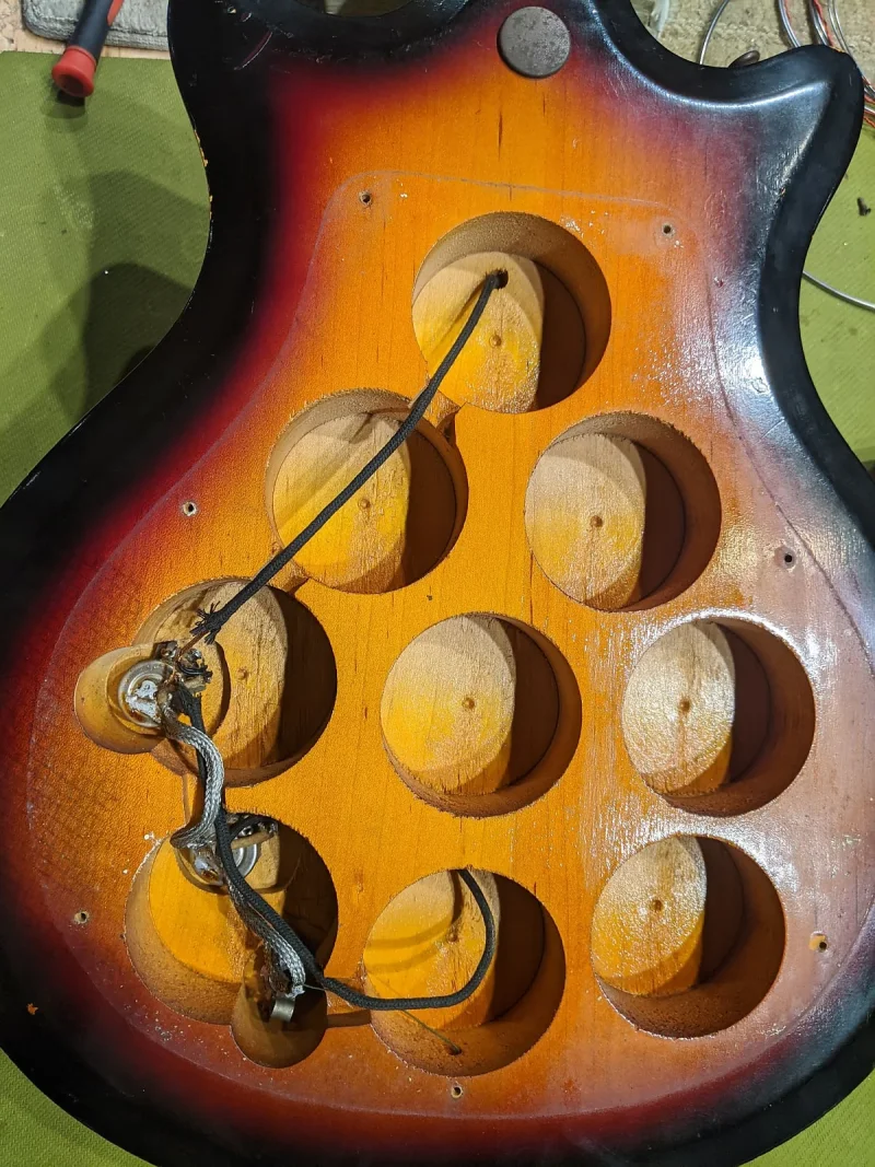 Airline Swiss cheese guitar Let's Talk Guild